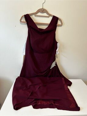 Elegant Burgundy Ball Gown with Side Crystal Detail
